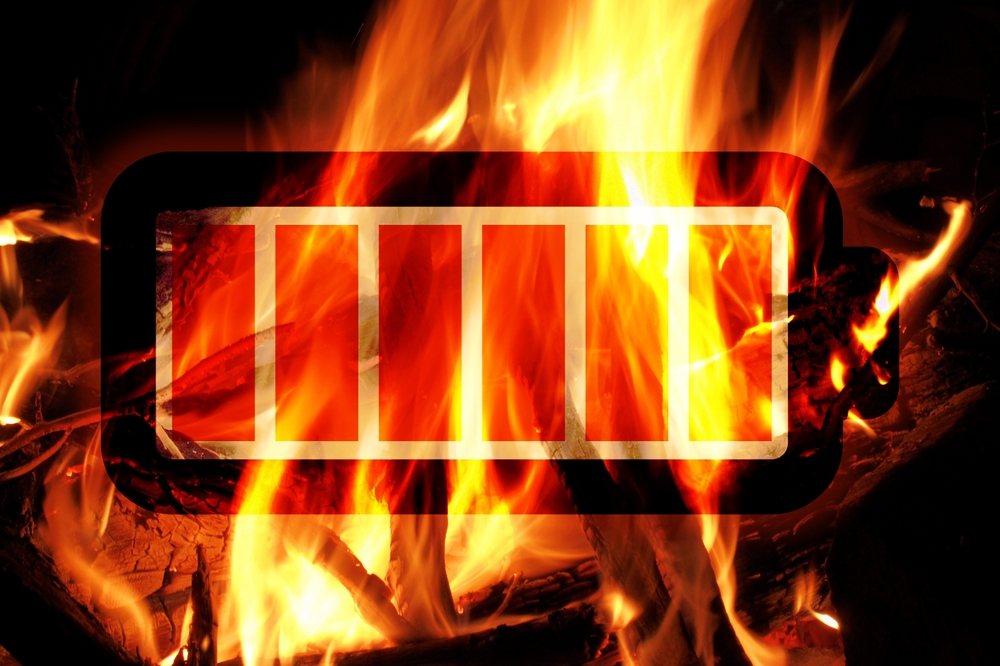 Battery,Fire,,Illustration,Of,Li-ion,Battery,In,Front,Of,Burning