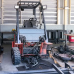 Broken,Forklift,In,Car,Repairing,Workshop
